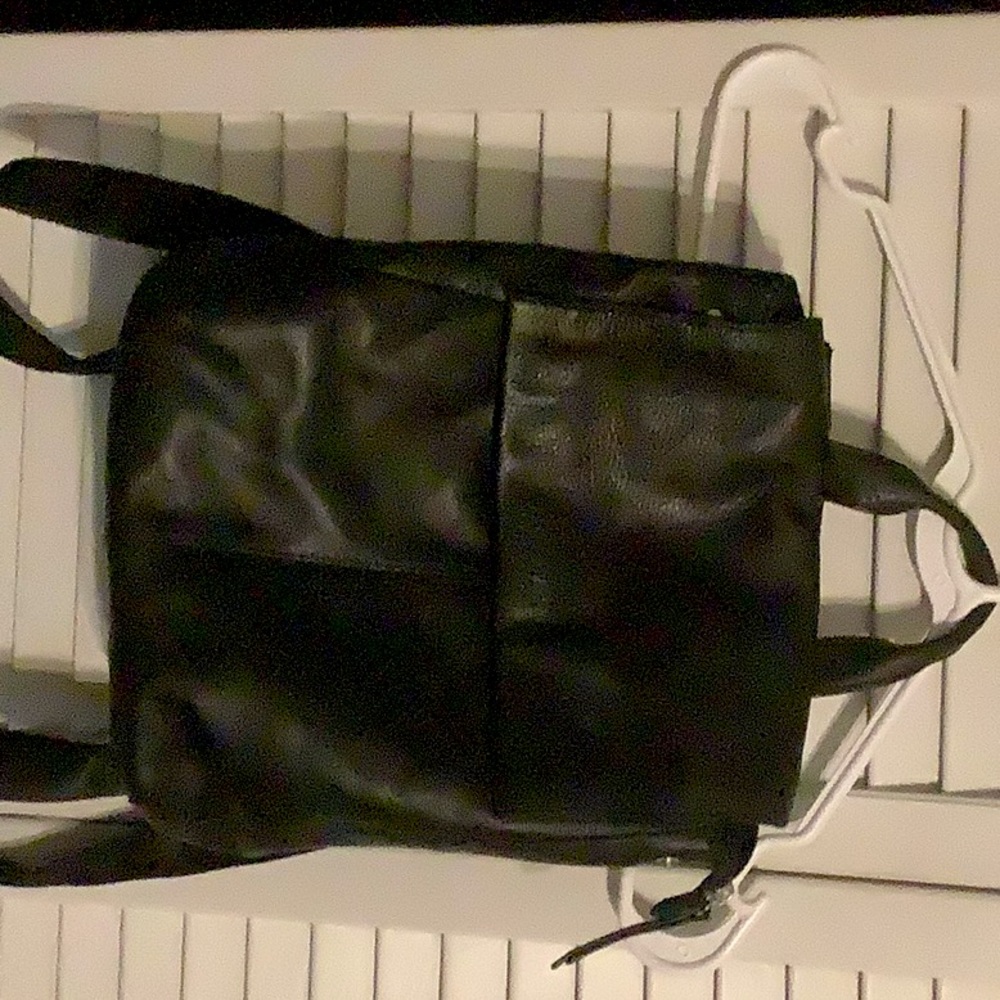 Leather backpack to carry as a purse